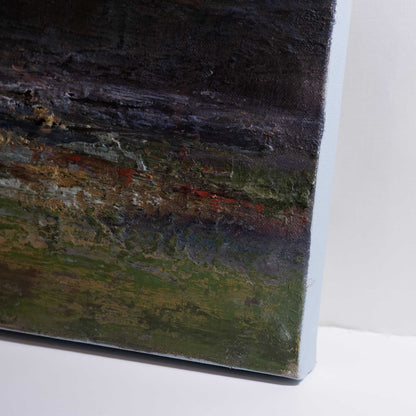 close up of right hand corner showing deep rich colours and texture