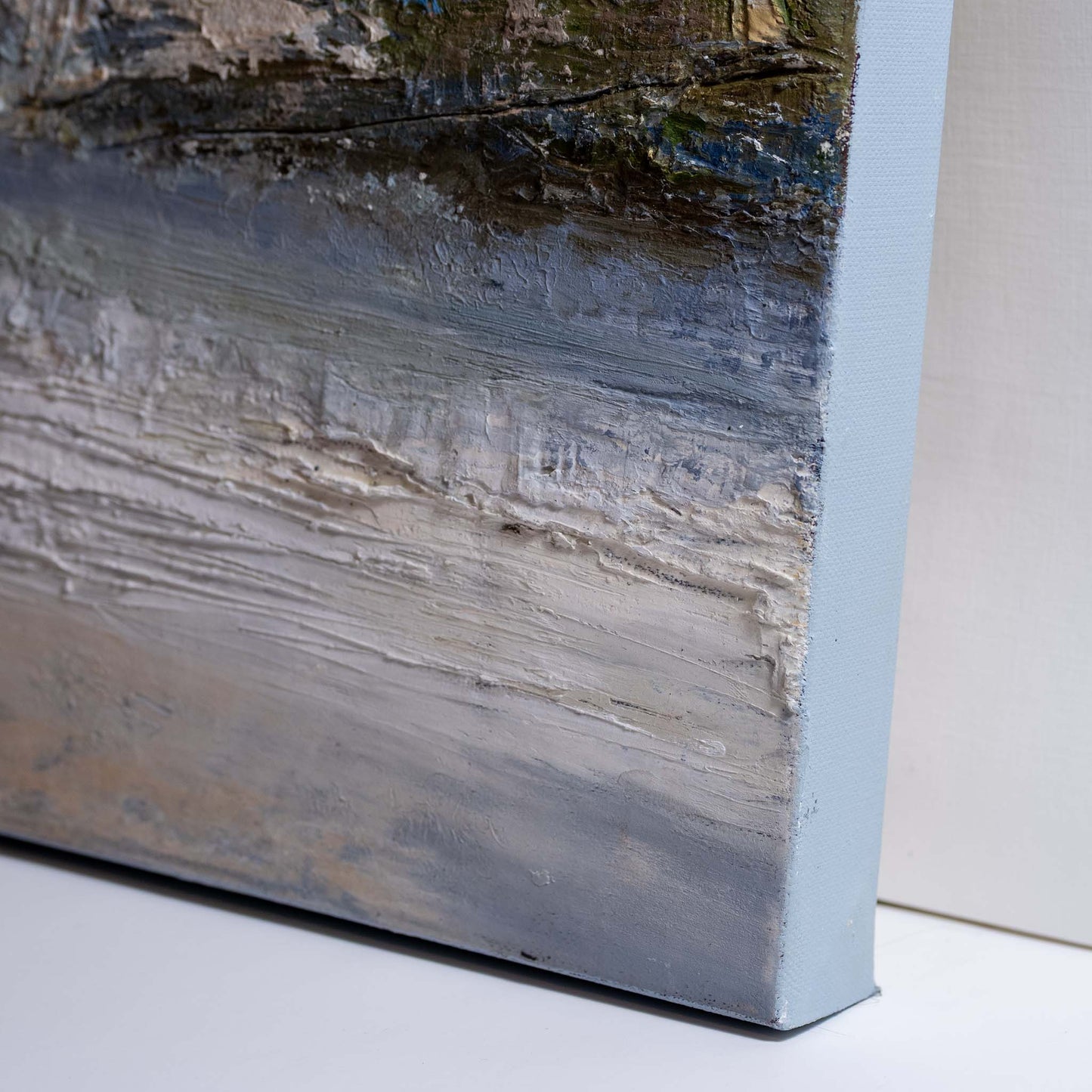 close up of right hand corner  showing highly textured rich colours