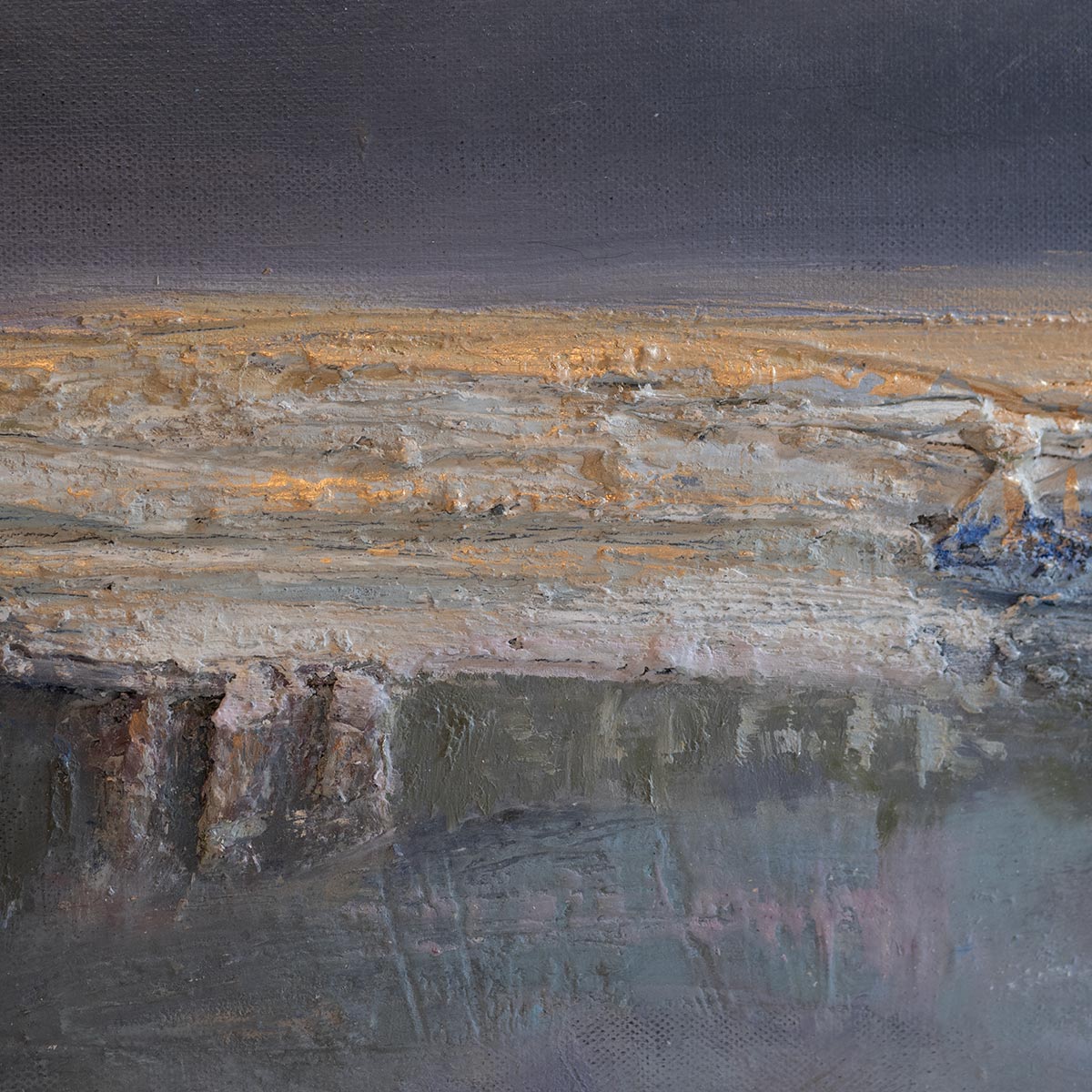 close up of gold and texture raised above canvas