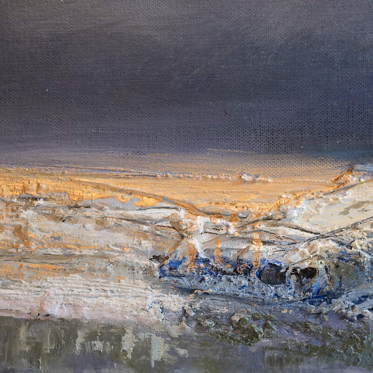 close up of gold and texture raised above canvas