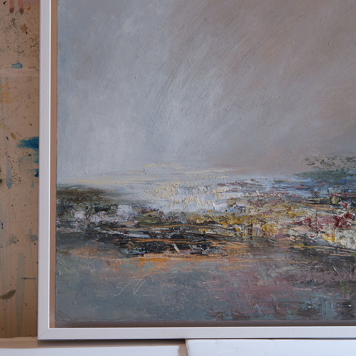 close up of lefthand corner with white floating frame showing textures and layers. Gold underneath showing through