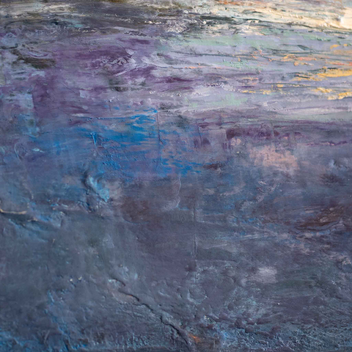 Abstract textured painting with layered brushstrokes in deep blue, purple, gray, and soft hints of gold and white.